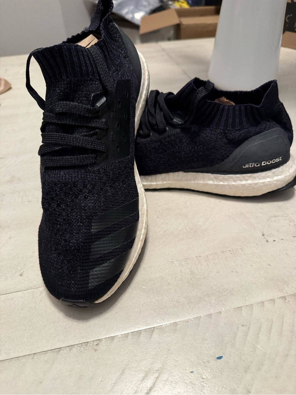 adidas Men’s Ultra Boost Knit Sneakers in Black and White